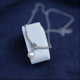 Pearl Drop Curved Bar Necklace